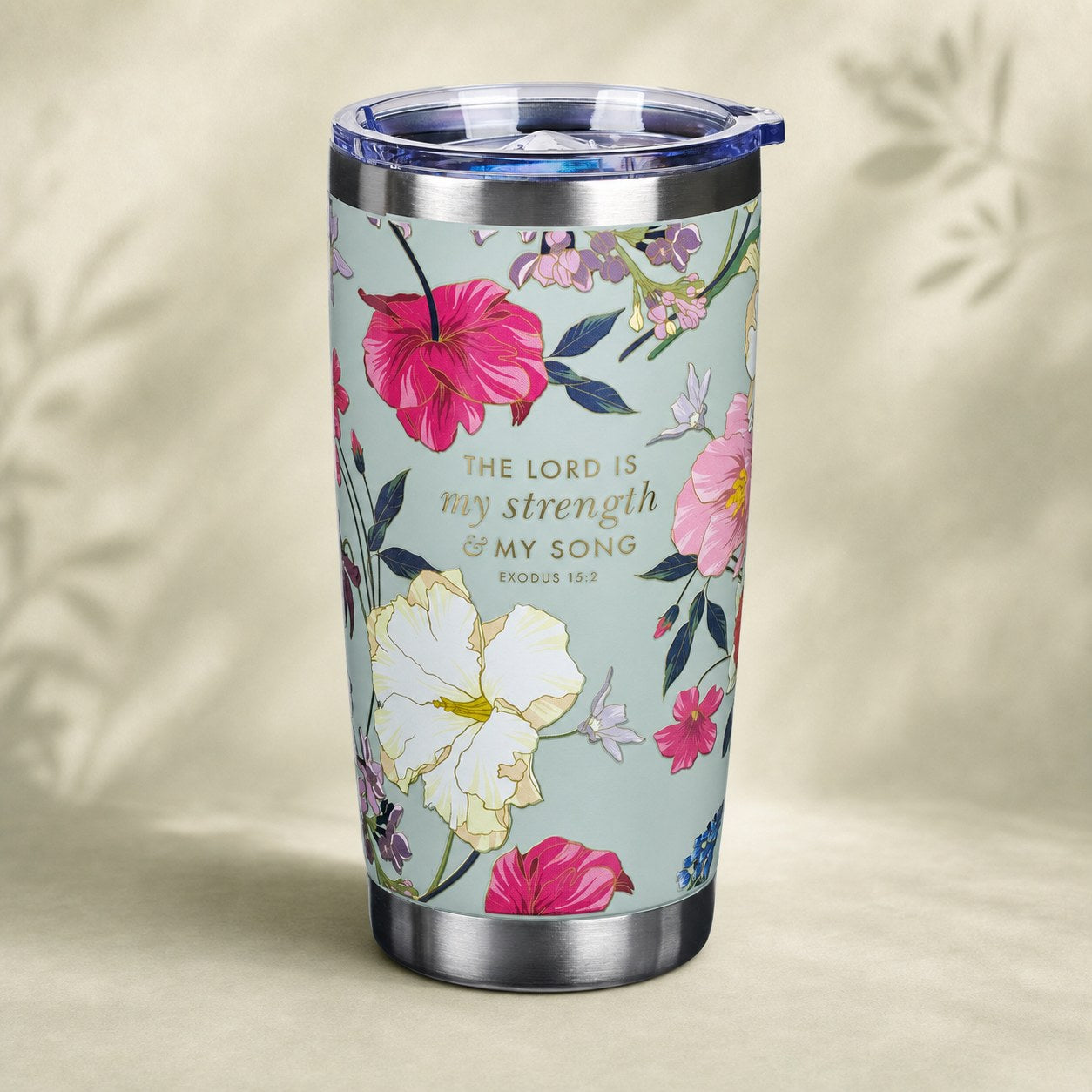 Teal Strength tumbler on a warm sage and cream background